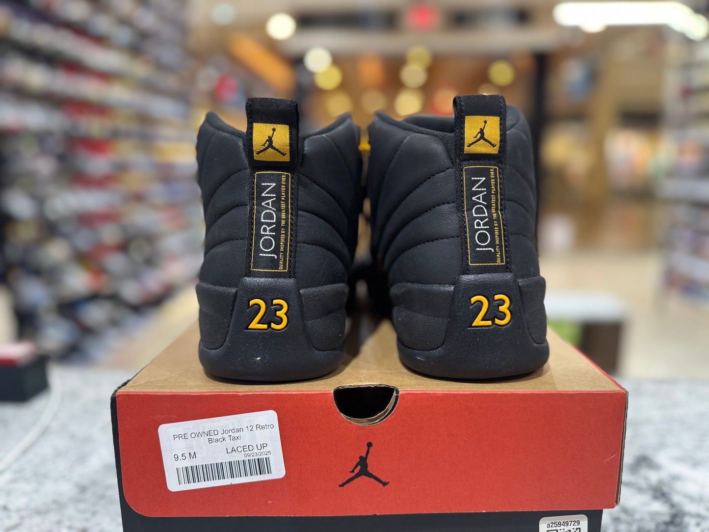 PRE OWNED Jordan 12 Retro Black Taxi