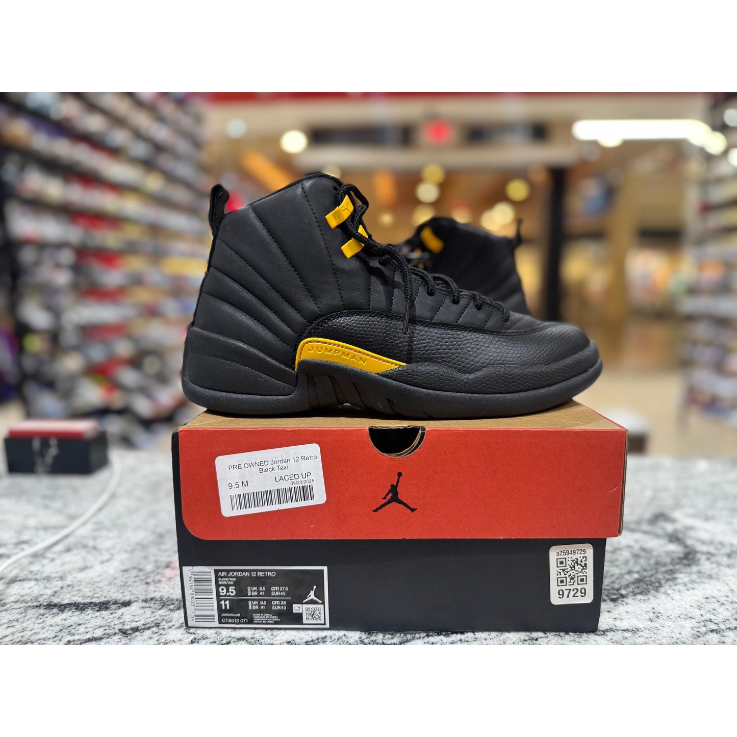 PRE OWNED Jordan 12 Retro Black Taxi